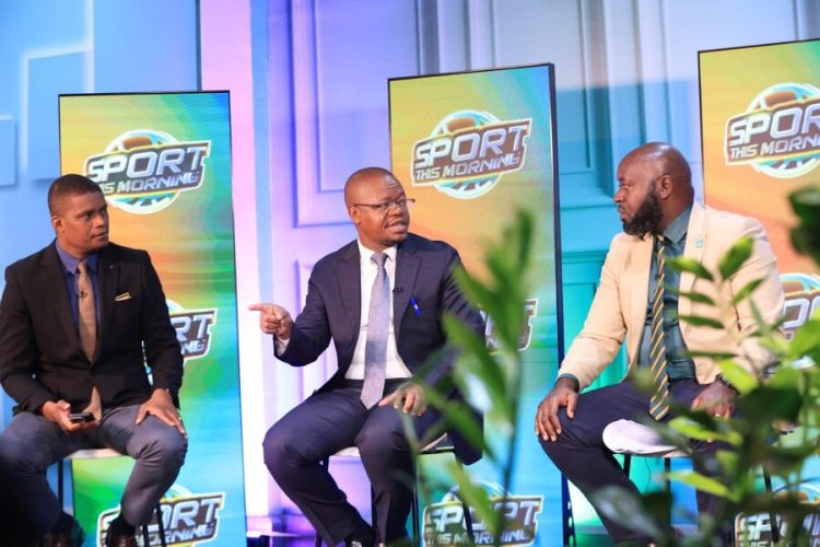 Moses Magogo (in the middle)